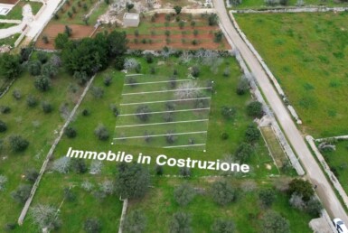 Terreno panoramico con progetto approvato di villa con piscina